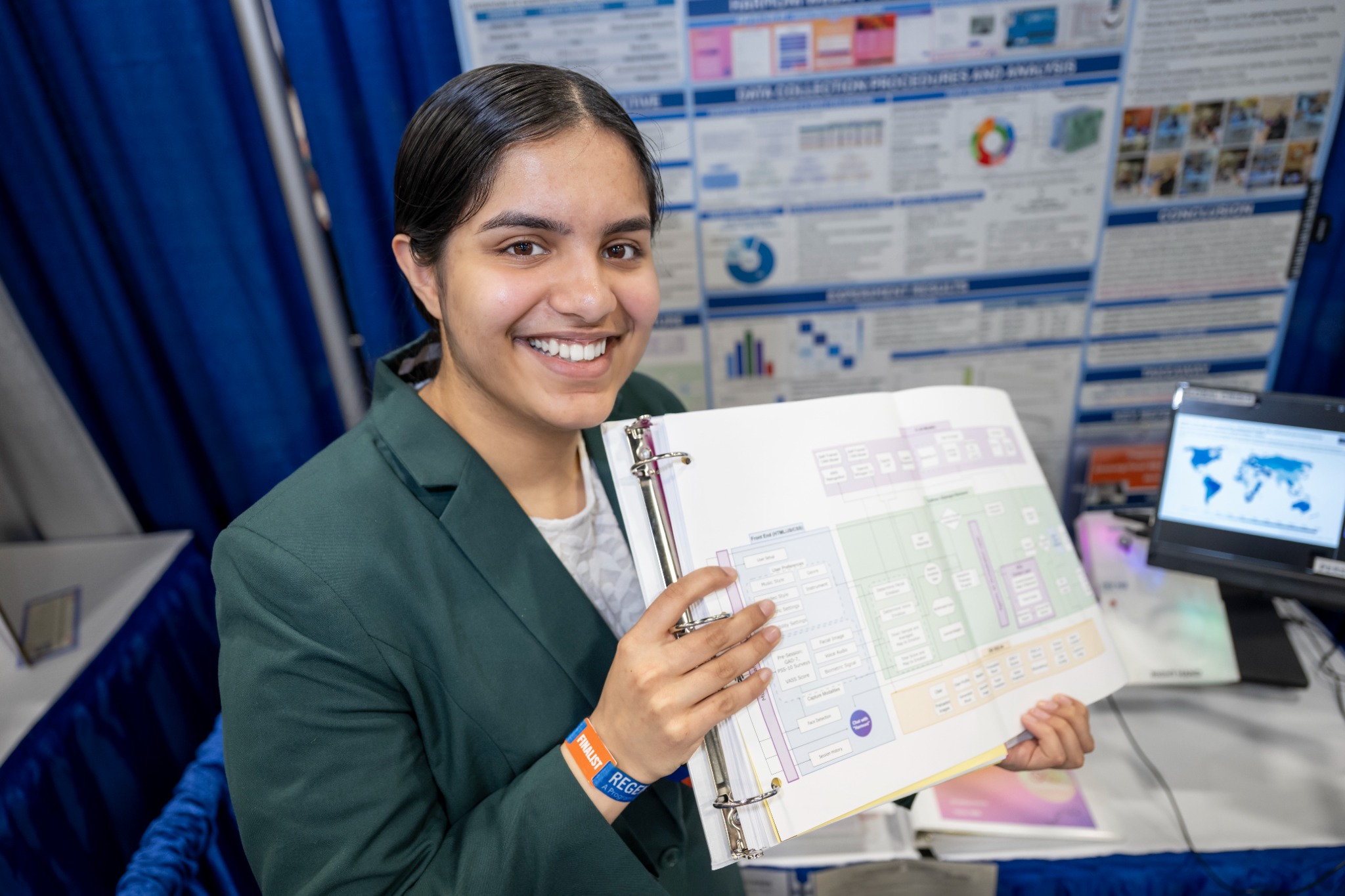 Anusha presenting HARMONI at Regeneron ISEF